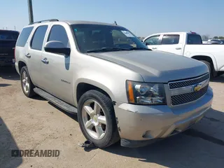 2007 Chevrolet Tahoe LS z VIN 1GNEC13JX7R169138, wystawiony jako IAAI lot #41687135 z przebiegiem Nie podano mil oraz . Historia ofert i sprzedaży dostępna na DreamBid. Obrazek 1.