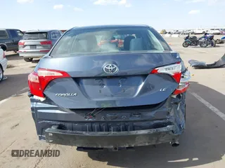 2018 Toyota Corolla L with VIN 5YFBURHEXJP806632, listed as a IAAI auction lot 41933984 with 70,091 mi miles and . Bid and sale history available at DreamBid. Image 17.