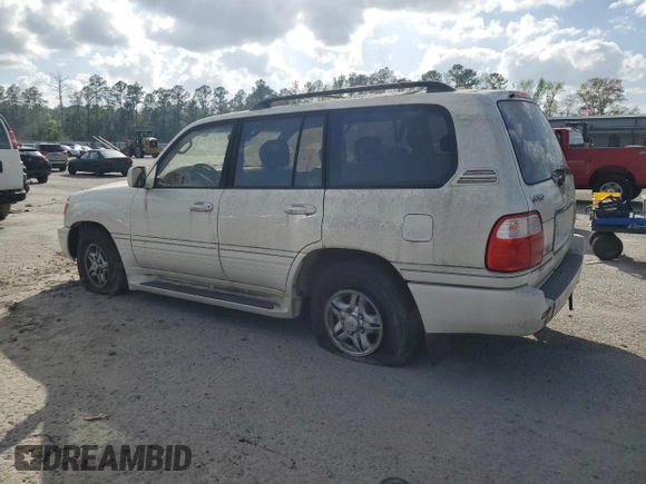 2002 Lexus LX 470 z VIN JTJHT00W623517039, wystawiony jako Copart lot #51458785 z przebiegiem 219 906 mil mil oraz Tytuł czysty. Historia ofert i sprzedaży dostępna na DreamBid. Obrazek 2.