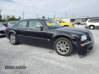 2005 Chrysler 300 C with VIN 2C3AA63H15H525775, listed as a Copart auction lot 52018135 with 59,098 mi miles and Salvage Title. Bid and sale history available at DreamBid. Image 4.