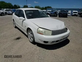 2003 Saturn LS z VIN 1G8JW54R43Y514930, wystawiony jako Copart lot #63652944 z przebiegiem 178 497 mil mil oraz Nie do naprawy. Historia ofert i sprzedaży dostępna na DreamBid. Obrazek 10.