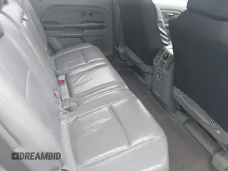 2005 Honda Pilot EX-L with VIN 5FNYF18585B037135, listed as a IAAI auction lot 41930914 with 227,956 mi miles. Bid and sale history available at carsss.com. Image 8.