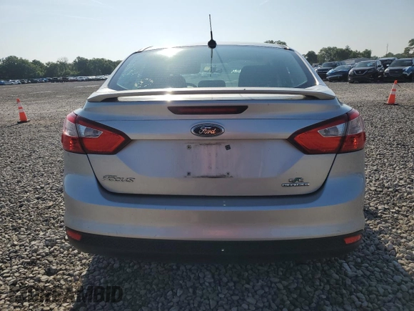 2013 Ford Focus SE with VIN 1FADP3F20DL142026, listed as a Copart auction lot 61855025 with 148,851 mi miles and Salvage title. Bid and sale history available at DreamBid. Image 6.