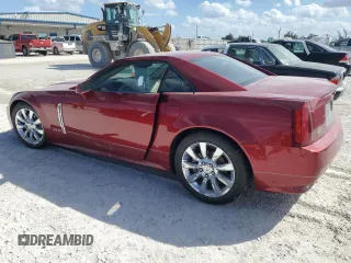 2009 Cadillac XLR Platinum z VIN 1G6YV36A595600621, wystawiony jako Copart lot #75302454 z przebiegiem Nie podano mil oraz Szkody całkowita. Historia ofert i sprzedaży dostępna na DreamBid. Obrazek 2.