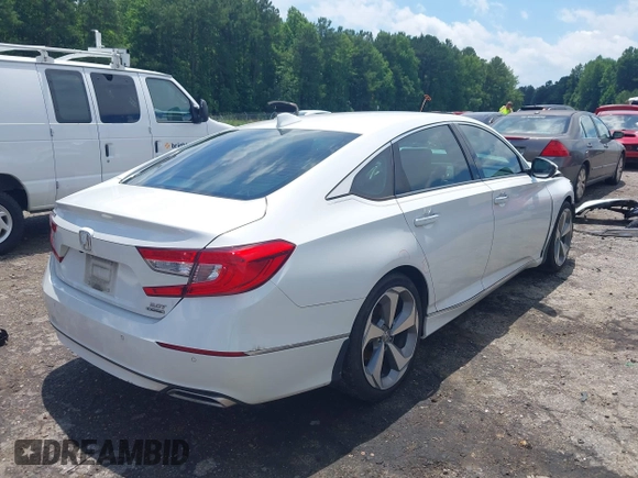 2019 Honda Accord Touring with VIN 1HGCV2F96KA015987, listed as a IAAI auction lot 42528744 with 174,735 mi miles and . Bid and sale history available at DreamBid. Image 4.