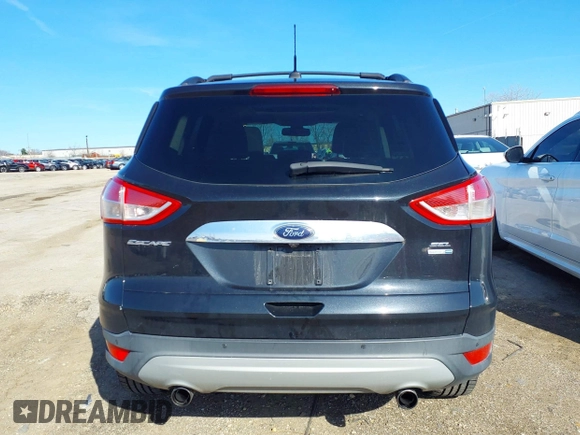 2013 Ford Escape SEL with VIN 1FMCU9HX1DUA20307, listed as a IAAI auction lot 41933873 with 164,962 mi miles. Bid and sale history available at carsss.com. Image 14.