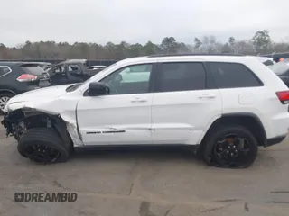 2018 Jeep Grand Cherokee Laredo E with VIN 1C4RJFAG2JC503130, listed as a IAAI auction lot 41527333 with 95,669 mi miles. Bid and sale history available at carsss.com. Image 14.
