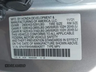 2021 Honda Passport EX-L with VIN 5FNYF8H54MB042677, listed as a IAAI auction lot 40732860 with 63,698 mi miles and . Bid and sale history available at DreamBid. Image 9.