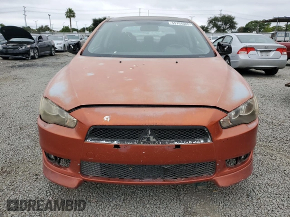 2009 Mitsubishi Lancer GTS z VIN JA3AU86W59U015875, wystawiony jako Copart lot #59764085 z przebiegiem 232 724 mil mil oraz Czysty tytuł • Clean title. Historia ofert i sprzedaży dostępna na DreamBid. Obrazek 5.