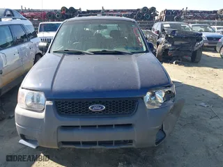 2003 Ford Escape XLS Popular with VIN 1FMYU02133KA02990, listed as a IAAI auction lot 41803174 with 140,792 mi miles. Bid and sale history available at carsss.com. Image 11.
