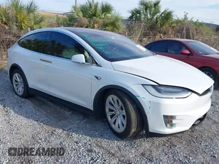 2019 Tesla Model X 75D with VIN 5YJXCAE23KF197563, listed as a IAAI auction lot 41455191 with 163,923 mi miles. Bid and sale history available at carsss.com. Image 1.