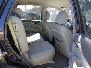 2009 Kia Borrego LX with VIN KNDJJ741995037531, listed as a IAAI auction lot 41738591 with 210,029 mi miles. Bid and sale history available at carsss.com. Image 8.