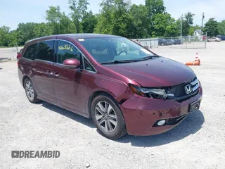 2016 Honda Odyssey Touring Elite with VIN 5FNRL5H96GB071925, listed as a IAAI auction lot 42631626 with 154,148 mi miles and . Bid and sale history available at DreamBid. Image 1.