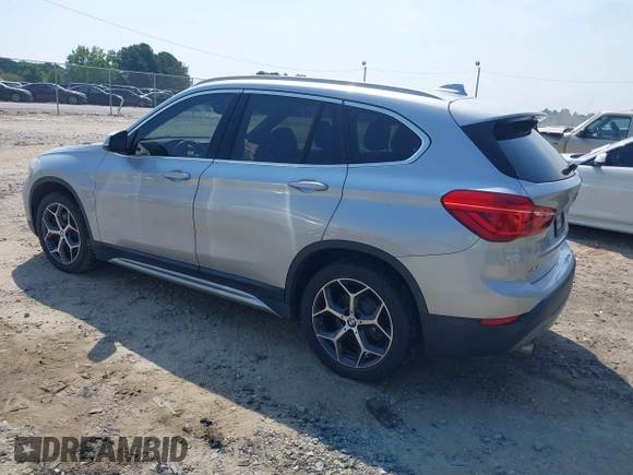 2018 BMW X1 xDrive28i with VIN WBXHT3C39J5L27926, listed as a IAAI auction lot 42582330 with 101,197 mi miles and . Bid and sale history available at DreamBid. Image 3.
