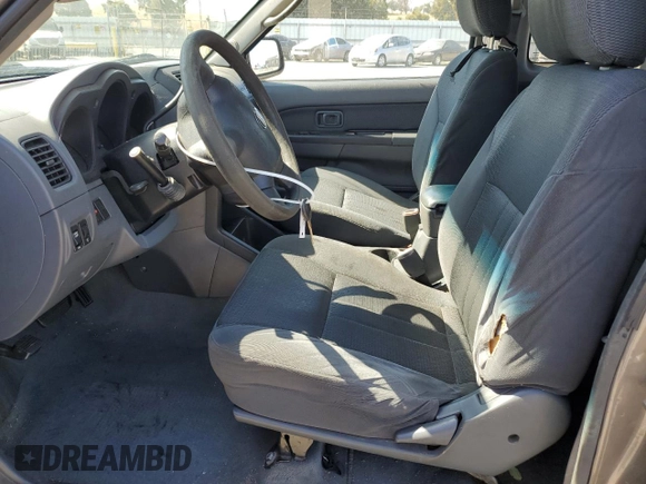 2004 Nissan Frontier XE with VIN 1N6DD26T14C412707, listed as a Copart auction lot 56789905 with 288,721 mi miles and Salvage title. Bid and sale history available at DreamBid. Image 7.