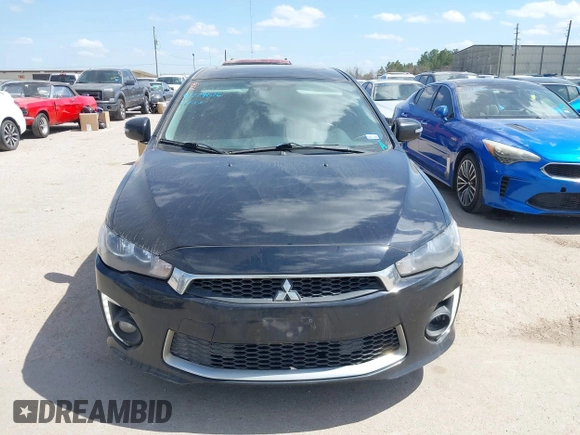 2016 Mitsubishi Lancer GT with VIN JA32U8FW8GU011501, listed as a IAAI auction lot 41779016 with 153,082 mi miles. Bid and sale history available at carsss.com. Image 6.