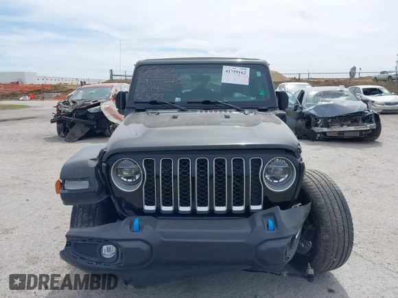 2022 Jeep Wrangler Unlimited Sahara with VIN 1C4JJXP69NW269462, listed as a IAAI auction lot 41759162 with 19,629 mi miles and . Bid and sale history available at DreamBid. Image 12.