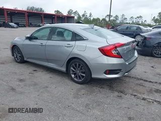 2021 Honda Civic Sedan EX-L with VIN 19XFC1F77ME008461, listed as a IAAI auction lot 41920231 with 31,912 mi miles. Bid and sale history available at carsss.com. Image 3.