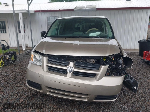 2009 Dodge Grand Caravan SE z VIN 2D8HN44E59R585342, wystawiony jako IAAI lot #42241676 z przebiegiem 329 636 mil mil oraz . Historia ofert i sprzedaży dostępna na DreamBid. Obrazek 12.