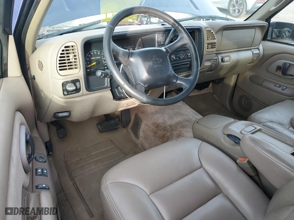 1999 Chevrolet Tahoe with VIN 3GNEK18R4XG124715, listed as a Copart auction lot 84744304 with 276,891 mi miles and Clean Title. Bid and sale history available at carsss.com. Image 8.