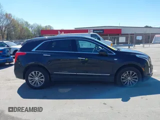2017 Cadillac XT5 Luxury AWD z VIN 1GYKNDRS6HZ325727, wystawiony jako IAAI lot #41900538 z przebiegiem 132 375 mil mil oraz . Historia ofert i sprzedaży dostępna na DreamBid. Obrazek 13.