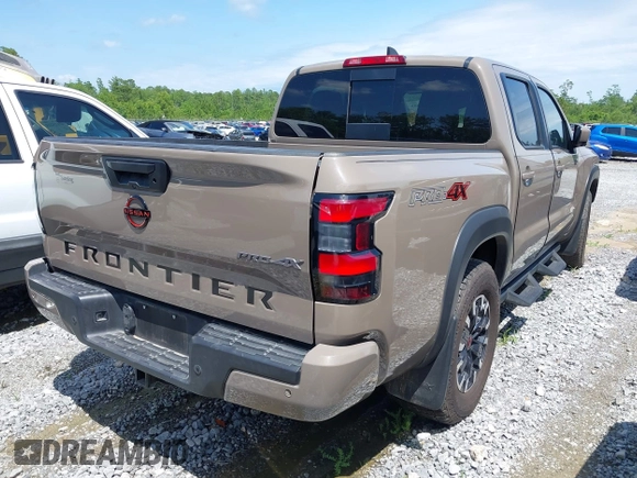 2023 Nissan Frontier Pro-4X z VIN 1N6ED1EK1PN602636, wystawiony jako IAAI lot #42018405 z przebiegiem 58 012 mil mil oraz . Historia ofert i sprzedaży dostępna na DreamBid. Obrazek 4.