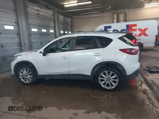 2013 Mazda CX-5 Grand Touring with VIN JM3KE4DE1D0159632, listed as a IAAI auction lot 41524272 with 99,479 mi miles. Bid and sale history available at carsss.com. Image 14.