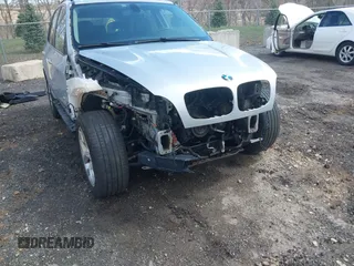 2012 BMW X5 35i z VIN 5UXZV4C56CL986384, wystawiony jako IAAI lot #41986665 z przebiegiem Nie podano mil oraz . Historia ofert i sprzedaży dostępna na DreamBid. Obrazek 6.