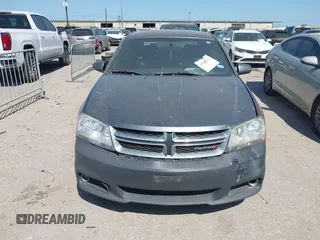 2013 Dodge Avenger SXT with VIN 1C3CDZCB8DN562180, listed as a IAAI auction lot 42000811 with 207,872 mi miles and . Bid and sale history available at carsss.com. Image 14.