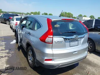 2015 Honda CR-V LX z VIN 2HKRM3H39FH500617, wystawiony jako IAAI lot #42028379 z przebiegiem 97 117 mil mil oraz . Historia ofert i sprzedaży dostępna na DreamBid. Obrazek 3.
