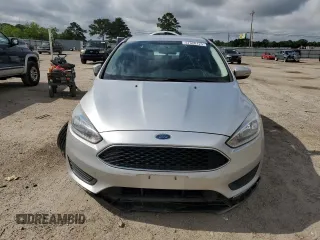2017 Ford Focus SE with VIN 1FADP3F23HL328312, listed as a Copart auction lot 57028125 with 116,498 mi miles and Salvage title. Bid and sale history available at DreamBid. Image 5.