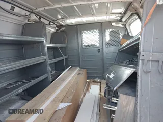 2014 Ford Econoline Cargo Commercial with VIN 1FTNE1EW4EDB20183, listed as a IAAI auction lot 42231075 with 260,818 mi miles and . Bid and sale history available at DreamBid. Image 8.