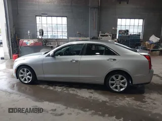 2016 Cadillac ATS Standard AWD z VIN 1G6AG5RX6G0149829, wystawiony jako IAAI lot #42165534 z przebiegiem 40 996 mil mil oraz . Historia ofert i sprzedaży dostępna na DreamBid. Obrazek 14.