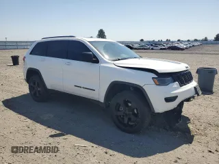 2020 Jeep Grand Cherokee Altitude with VIN 1C4RJFAGXLC141194, listed as a Copart auction lot 55666415 with 69,849 mi miles and Salvage title. Bid and sale history available at DreamBid. Image 4.