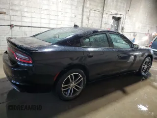 2019 Dodge Charger SXT with VIN 2C3CDXJG1KH757949, listed as a Copart auction lot 82231714 with 75,985 mi miles and Salvage Title. Bid and sale history available at DreamBid. Image 3.