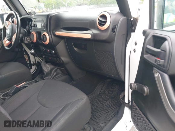 2018 Jeep Wrangler Unlimited Sport S with VIN 1C4BJWDG7JL895132, listed as a IAAI auction lot 42435993 with 71,394 mi miles and . Bid and sale history available at DreamBid. Image 5.