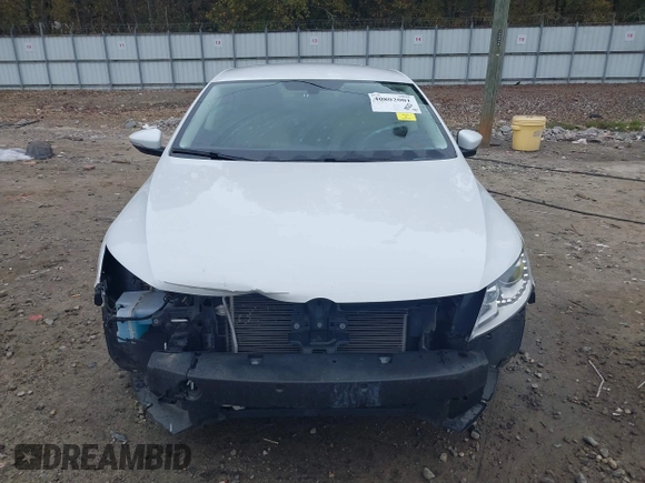 2016 Volkswagen CC Sport with VIN WVWBN7AN4GE512547, listed as a IAAI auction lot 40802001 with 94,513 mi miles. Bid and sale history available at carsss.com. Image 13.