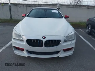 2013 BMW 6 Series 650i with VIN WBAYM9C57DDW20312, listed as a IAAI auction lot 41861212 with 98,662 mi miles and . Bid and sale history available at carsss.com. Image 6.