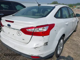 2012 Ford Focus SE with VIN 1FAHP3F21CL192126, listed as a IAAI auction lot 42598631 with 125,741 mi miles and . Bid and sale history available at DreamBid. Image 6.