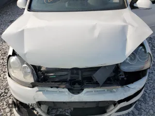 2009 Volkswagen GTI z VIN WVWFV71K29W121109, wystawiony jako Copart lot #70344254 z przebiegiem 102 475 mil mil oraz Szkoda całkowita • Salvage title. Historia ofert i sprzedaży dostępna na DreamBid. Obrazek 11.