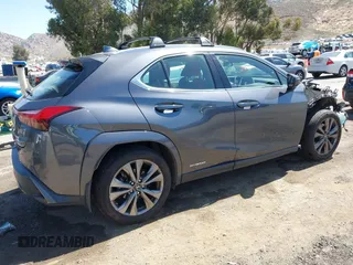 2022 Lexus UX 250h F Sport with VIN JTHE9JBHXN2057109, listed as a IAAI auction lot 42265432 with 76,822 mi miles and . Bid and sale history available at DreamBid. Image 4.