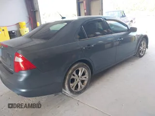 2012 Ford Fusion SE z VIN 3FAHP0HG6CR170633, wystawiony jako IAAI lot #42770990 z przebiegiem 233 383 mil mil oraz . Historia ofert i sprzedaży dostępna na DreamBid. Obrazek 4.