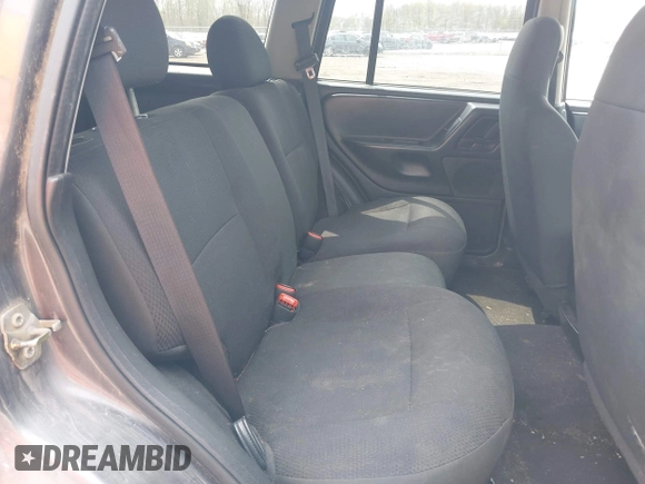 2004 Jeep Grand Cherokee Laredo z VIN 1J4GW48S34C399804, wystawiony jako IAAI lot #42163326 z przebiegiem 203 278 mil mil oraz . Historia ofert i sprzedaży dostępna na DreamBid. Obrazek 8.