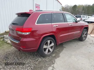 2015 Jeep Grand Cherokee High Altitude with VIN 1C4RJECG7FC884942, listed as a IAAI auction lot 41852796 with 110,454 mi miles. Bid and sale history available at carsss.com. Image 4.
