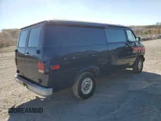 1988 Chevrolet Chevy Van z VIN 1GCEG25H5J7124768, wystawiony jako Copart lot #76781664 z przebiegiem 86 588 mil mil oraz Tytuł czysty. Historia ofert i sprzedaży dostępna na DreamBid. Obrazek 3.