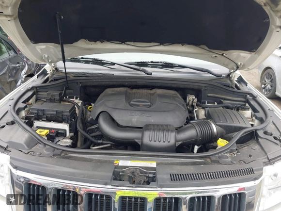2011 Jeep Grand Cherokee Laredo with VIN 1J4RR4GG0BC670506, listed as a IAAI auction lot 42462778 with 241,406 mi miles and . Bid and sale history available at DreamBid. Image 10.