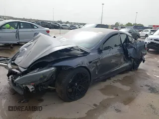 2021 Tesla Model S Plaid z VIN 5YJSA1E6XMF429436, wystawiony jako IAAI lot #41826114 z przebiegiem Nie podano mil oraz . Historia ofert i sprzedaży dostępna na DreamBid. Obrazek 19.