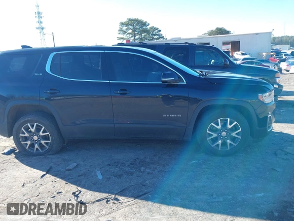 2021 GMC Acadia SLE with VIN 1GKKNKLA9MZ136112, listed as a IAAI auction lot 41212337 with 76,827 mi miles and . Bid and sale history available at DreamBid. Image 13.