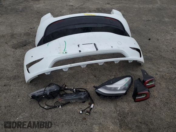2020 Tesla Model Y Long Range with VIN 5YJYGDEE5LF053938, listed as a Copart auction lot 43381985 with 69,291 mi miles and Salvage Title. Bid and sale history available at DreamBid. Image 14.