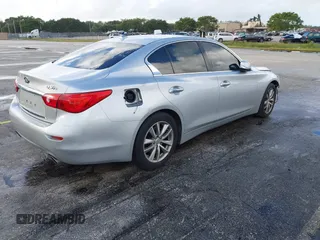 2015 Infiniti Q50 Premium with VIN JN1BV7AP9FM358782, listed as a IAAI auction lot 41103963 with 96,853 mi miles. Bid and sale history available at carsss.com. Image 4.
